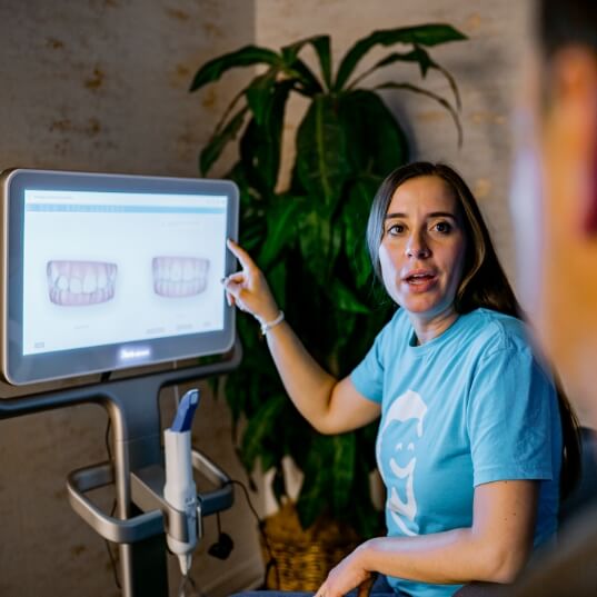 Orthodontist using digital x ray and smile design software