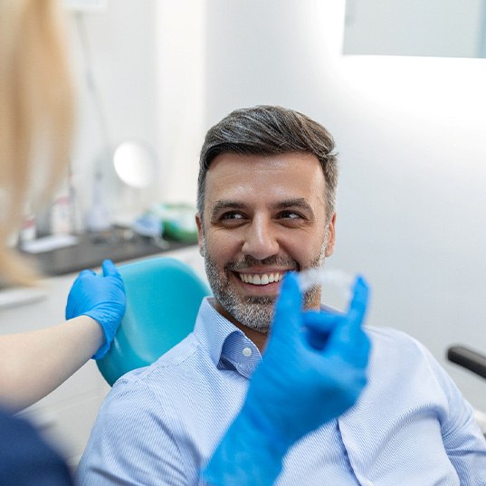 Naperville patient smiling with clear aligners