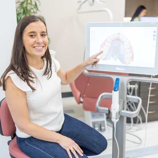 Orthodontist using digital x ray and smile design software