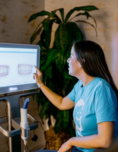 Orthodontist looking at digital smile impressions