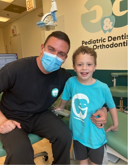 Doctor Cory and young dental patient