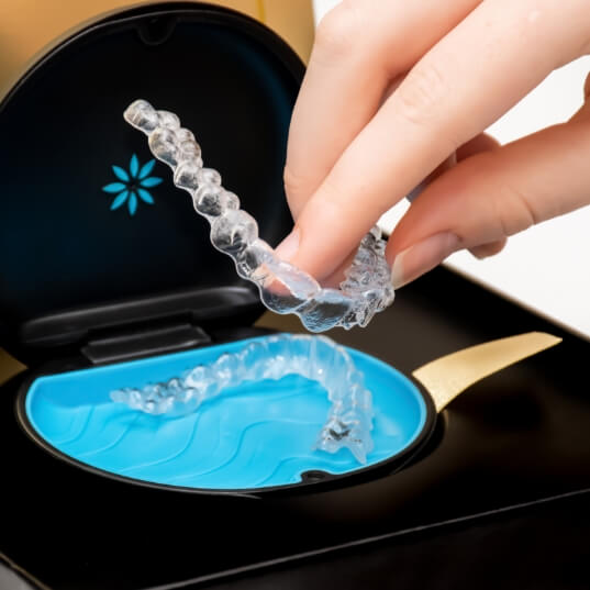 Set of Invisalign clear braces in carrying case