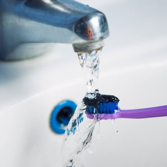 Silver diamine fluoride gel on toothbrush