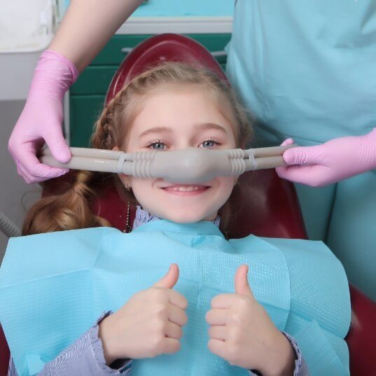 Child preparing for pediatric dentistry under general anesthesia
