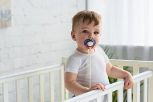 Baby with pacifier.